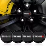4pcs 56mm Car Wheel Center Cover Stickers for Nissan Tiida, Juke, X-Trail 3 5855-dad63d.webp